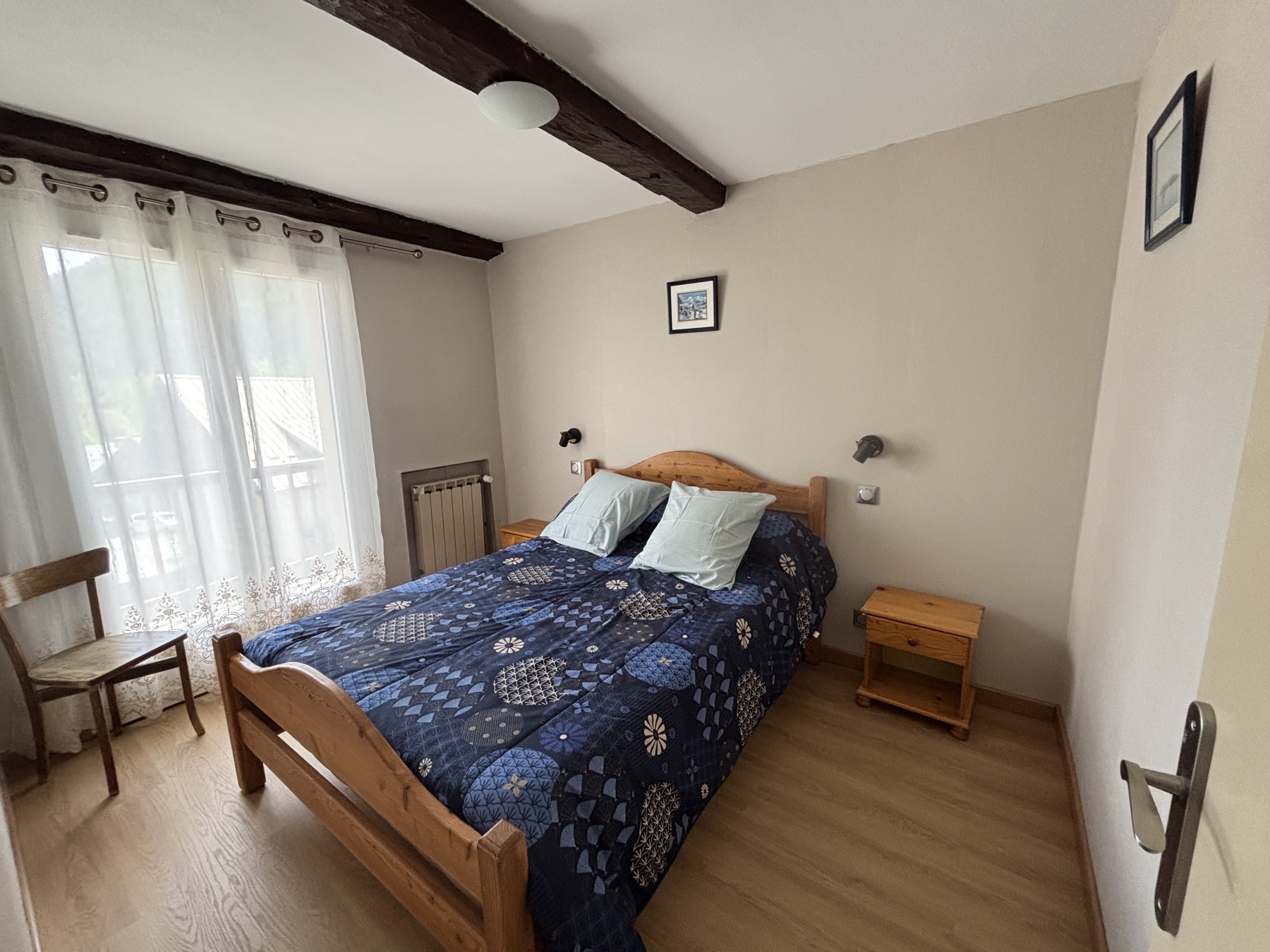 Chambre double avec poutres apparentes